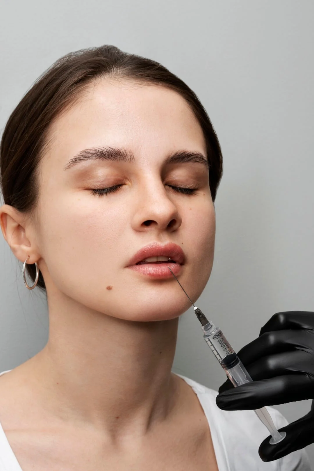 beautiful-woman-getting-lip-fillers-clinic (Large)